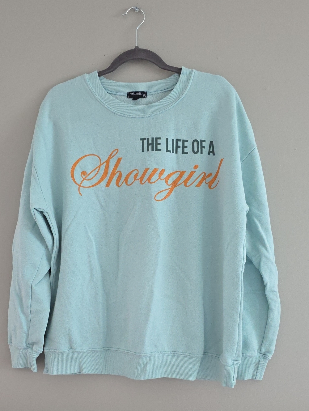 Originality Co. Light Blue 'The Life of a Showgirl' Crewneck Sweatshirt
